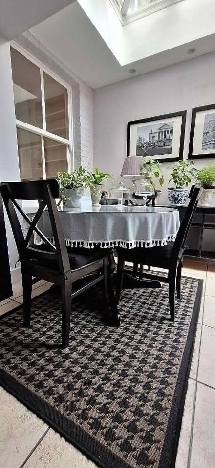 Photo of free Black Wood round table and 4 chair (Lion Gate TW9) #1