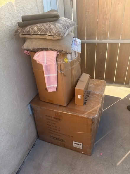 Photo of free Boxe off unused clothes (92115 , 4763 63rd SD CA) #1