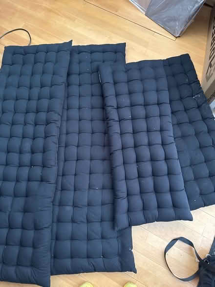 Photo of free 4 black bench cushions (Shepherds Bush W6) #1