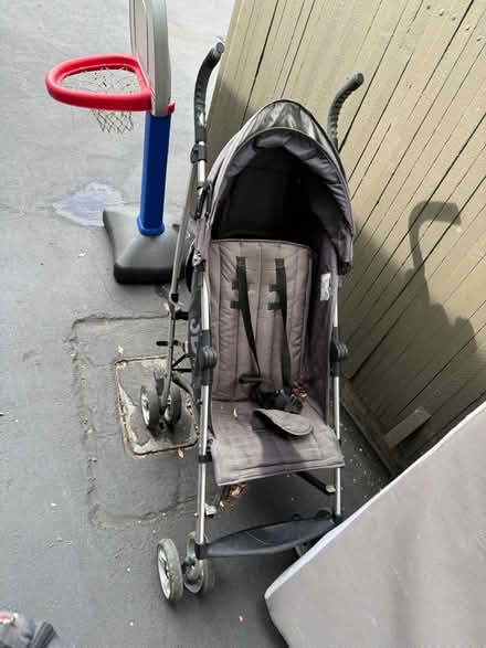 Photo of free Small lightweight hooded stroller (1089 West Olive Avenue) #1