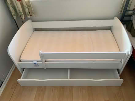 Photo of free Toddler Bed (Knotty Ash L14) #1