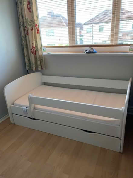 Photo of free Toddler Bed (Knotty Ash L14) #2
