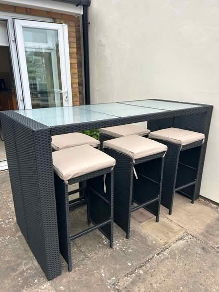 Photo of free Rattan and glass outdoor table and stools (Welwyn AL6) #1