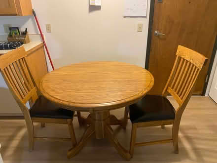 Photo of free 42” Circular Table & 2 Chairs (851 Faribault Rd., Faribault) #1