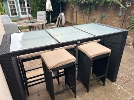 Photo of free Rattan and glass outdoor table and stools (Welwyn AL6) #4