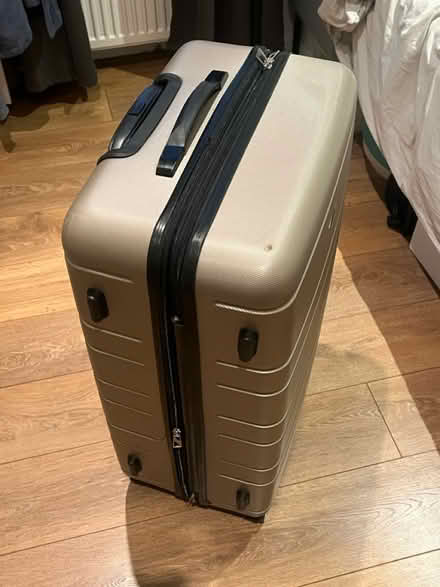 Photo of free Large suitcase with half wheel (Dalston junction E8) #2