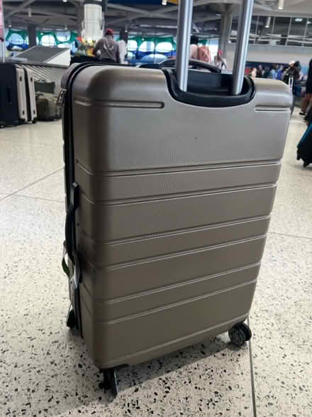 Photo of free Large suitcase with half wheel (Dalston junction E8) #4