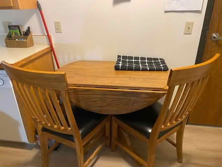 Photo of free 42” Circular Table & 2 Chairs (851 Faribault Rd., Faribault) #2