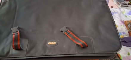 Photo of free black suitcase with red edging used with wheels (Wigmore LU2) #1