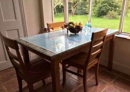 Photo of free Solid wood table with glass top and two chairs (Wingrave HP22) #1