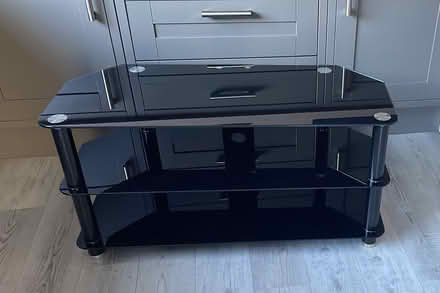 Photo of free Black glass TV stand (Darlington DL1) #1