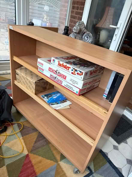 Photo of free Light wood bookcase on castors (B98 Church Hill north Redditch) #2