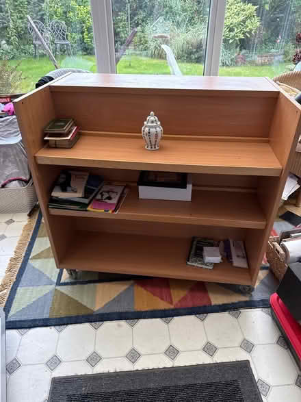 Photo of free Light wood bookcase on castors (B98 Church Hill north Redditch) #1