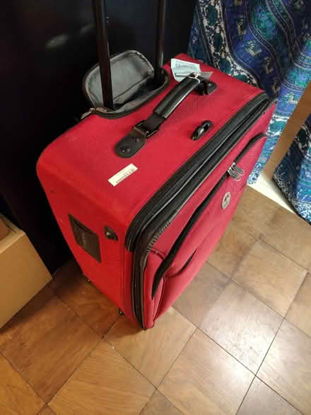 Photo of free Red suitcase (Nw) #2