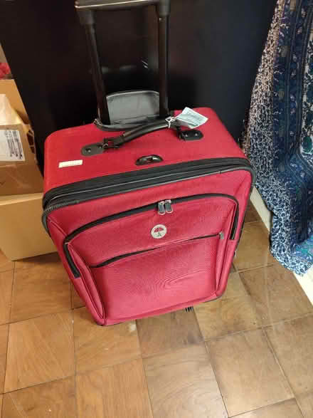Photo of free Red suitcase (Nw) #1
