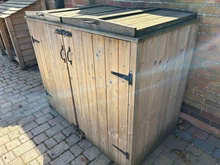 Photo of free Wooden Double Bin Storage Unit (South Cambridgeshire CB24) #1
