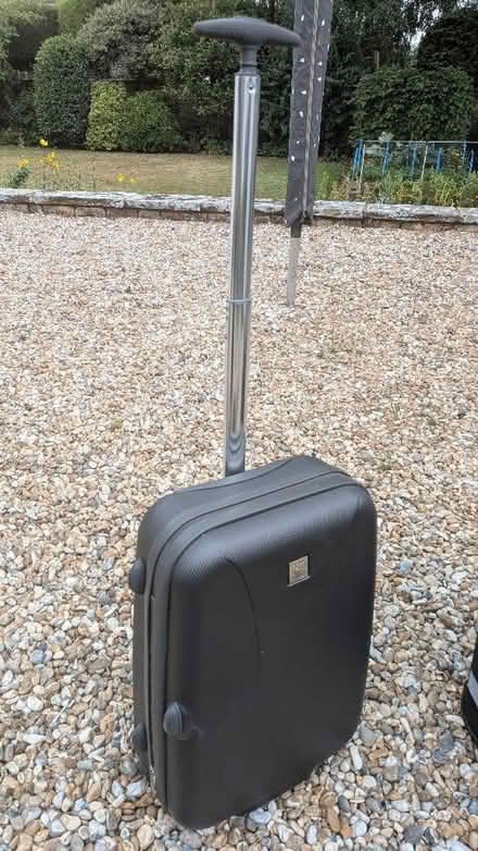 Photo of free Small hard shell suitcase. (Slyne-with-Hest LA2) #1