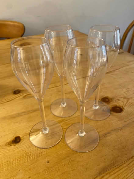 Photo of free Four plastic wine glasses/flutes (Round Hill BN2) #1