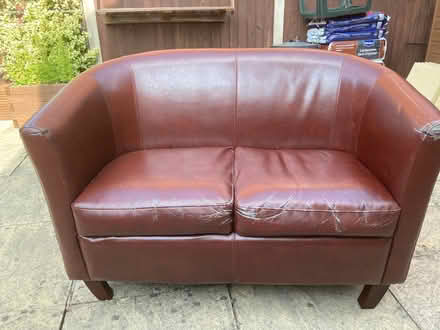 Photo of free Brown faux leather 2 seater settee (Dudleston Heath SY12) #1