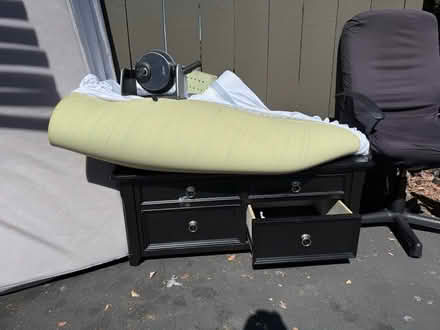 Photo of free Low-lying 4-drawer wooden dresser (1075 Valencia Avenue) #1