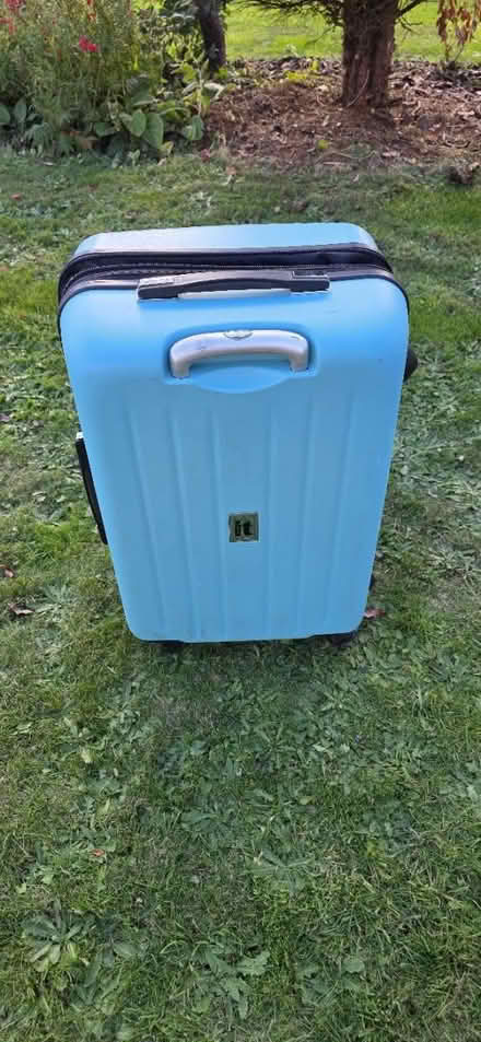 Photo of free Turquoise medium suitcase (Wr14 3pa) #1