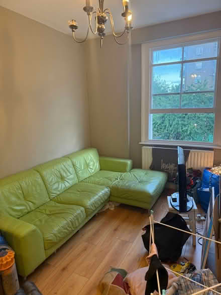 Photo of free Green leather sofa (Canonbury N1) #1