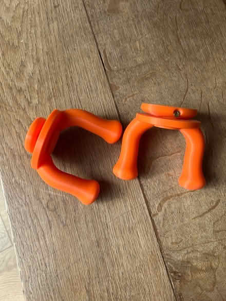 Photo of free Pair of orange electric guitar wall hangers (Little Herberts GL53) #3