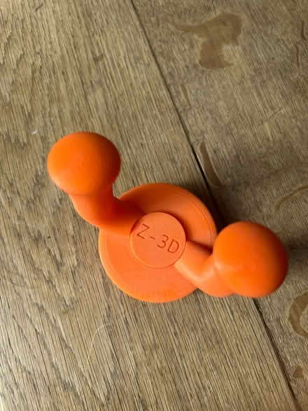 Photo of free Pair of orange electric guitar wall hangers (Little Herberts GL53) #2