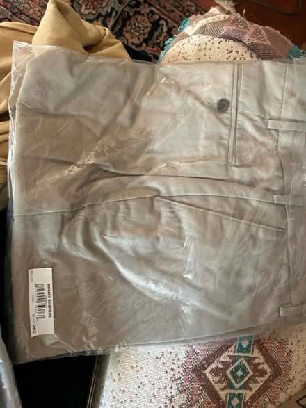 Photo of free New clothes pants and shirts (Fayetteville, NC) #1