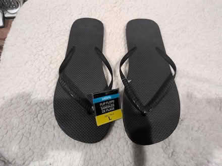 Photo of free Large flip flops - never worn (20882) #1