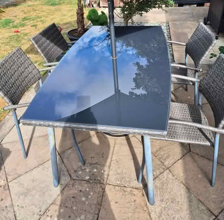 Photo of free Glass-top garden table (only) (Poole BH17) #1