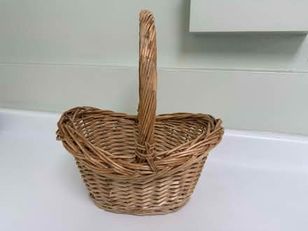 Photo of free Small wicker basket w handle (1075 Valencia Avenue) #1