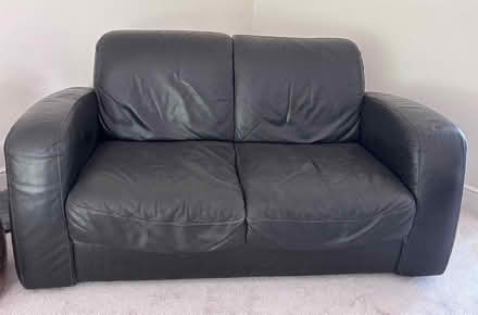 Photo of free Brown leather 2 seater sofa (Wymondham NR18) #1