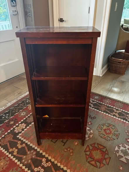 Photo of free Medium height dark wood bookshelf (16th St Heights/Petworth) #1