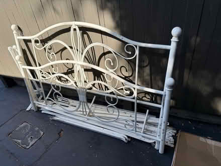 Photo of free White metal double bed frame (1089 West Olive Avenue) #1