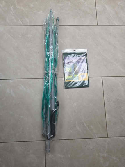 Photo of free Rotary airer and cover - unused (Bengeo SG14) #1