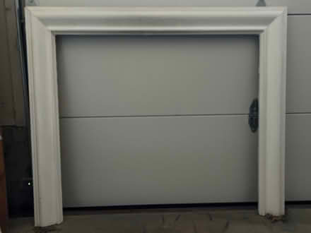 Photo of free Wood trim Fireplace Frame (Dogwood Trace) #1