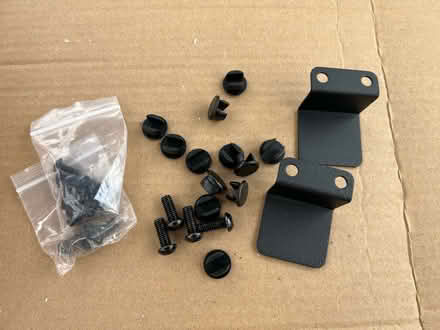 Photo of free 2 black metal plates with bolts (Hawthorne) #1
