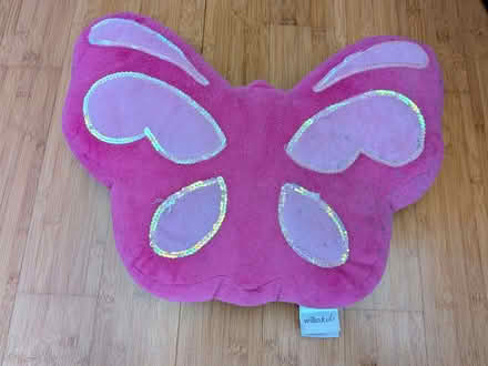 Photo of free Wilko butterfly cushion with label (East Ham E6) #1