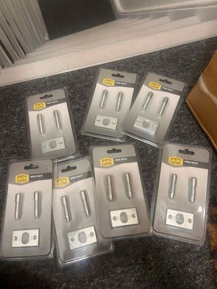 Photo of free 7 hinge bolts unopened (SE1 Kent Road) #1