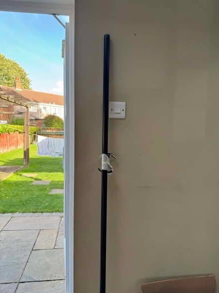 Photo of free 71inch black curtain pole (Pipers Ash CH2) #1