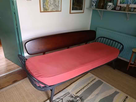 Photo of free Ercol day bed with red cushion (Kings Buildings EH9) #1