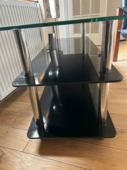 Photo of free Black glass tv table (G14 9hz) #3