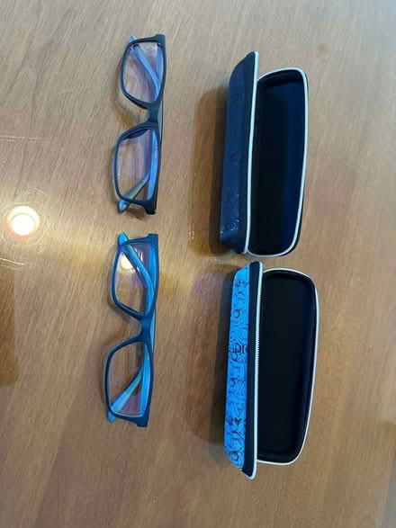 Photo of free 2 pair computer, blue lens hoasses (Hollenbeck and Remington) #1
