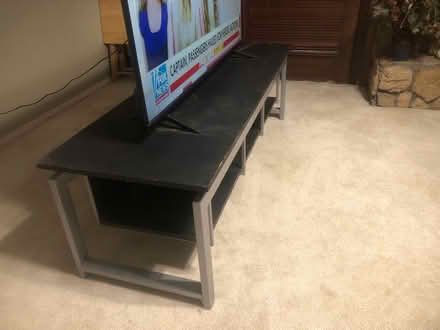 Photo of free TV stand (Crockett and Old Mill Run.) #1