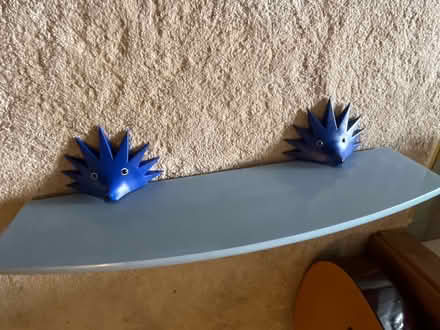 Photo of free Blue shelf with hedgehog brackets (Biddulph Moor ST8) #1