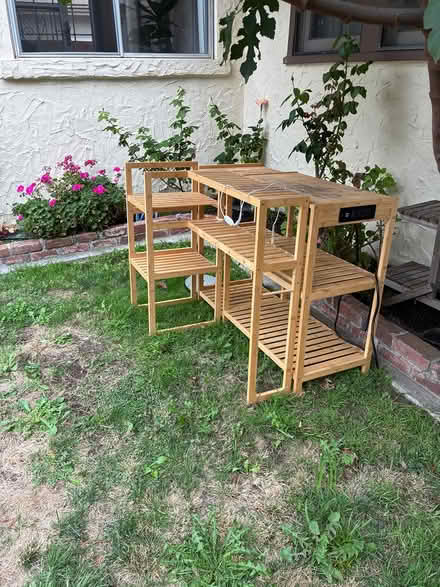 Photo of free Three wooden shelf used for (View st and Dana.) #1