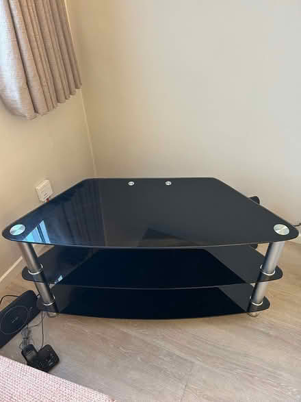 Photo of free Black glass tv corner unit (Horsham, RH12) #1