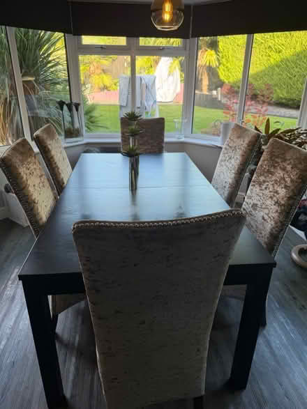 Photo of free Black wooden dining room table and chairs (Webheath B97) #1