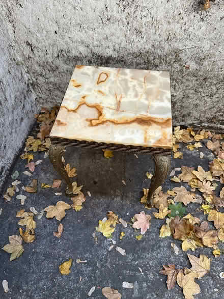 Photo of free Little onyx metal table (islington N1) #1